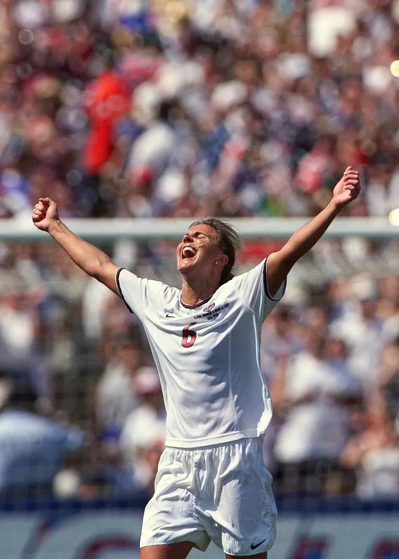 US women's national team's Brandi Chastain celebrating.